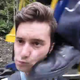 Illustration for article titled Guy trying to take a selfie gets kicked in the face by train conductor